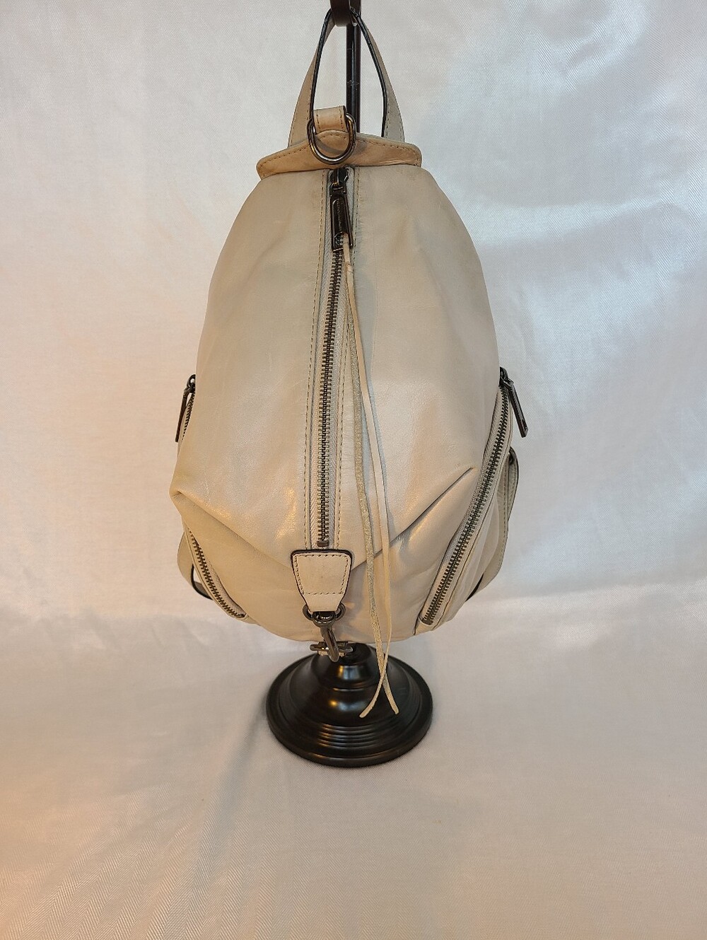 Rebecca Minkoff Julian backpack featuring vertical zipper in light grey